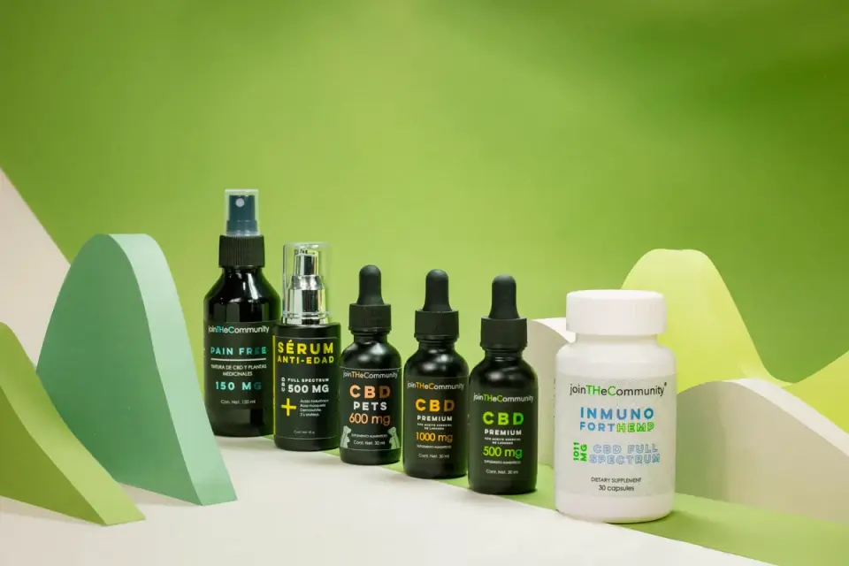 A fish oil supplement bottle and dropper for dogs on a kitchen counter