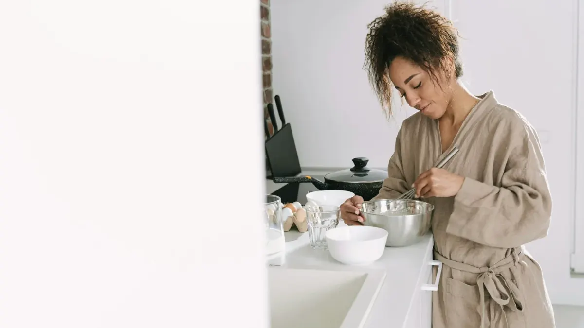 A veterinarian checks a dog's food bowl and stool notes on a kitchen counter