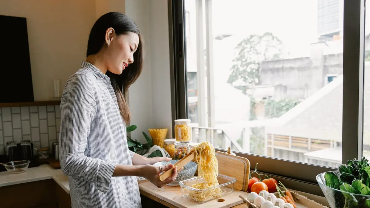 Dog owner preparing a meal