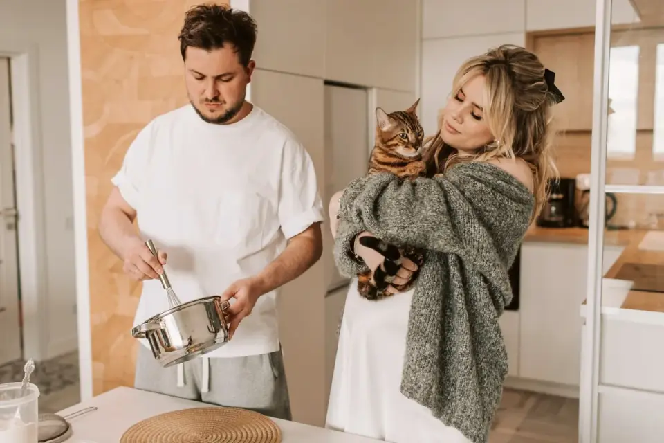 Dog owner preparing a meal