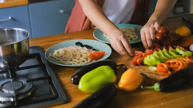 Dog owner preparing a meal
