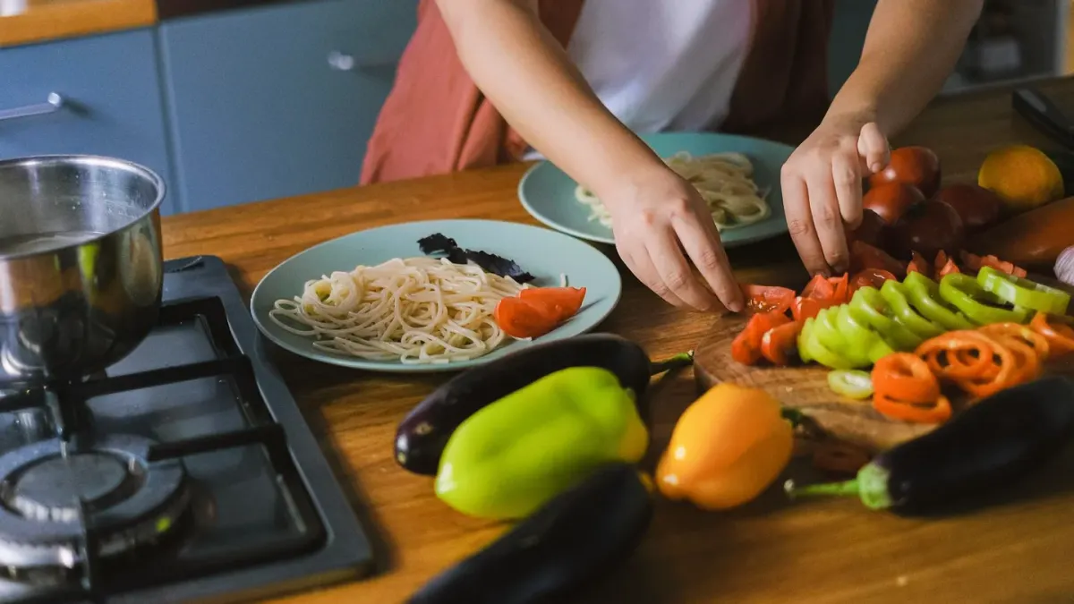Dog owner preparing a meal